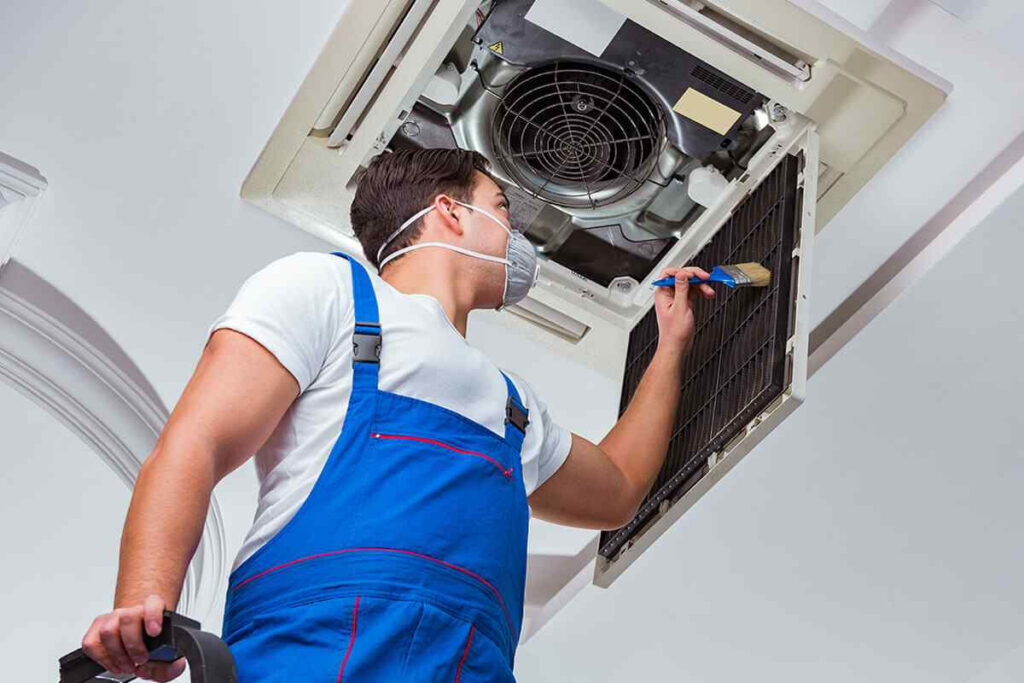 Technician performing AC AMC in Tirupati